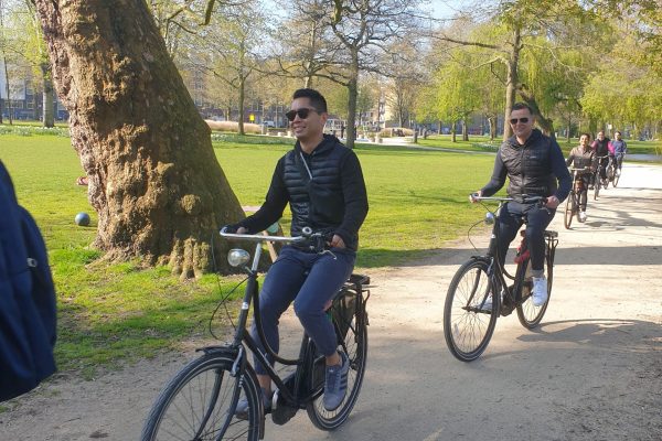 7. Escape the hectic tourist infested city center of Amsterdam and discover its many fascinating neighborhoods by bike
